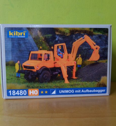 Kibri H0 18480 Unimog met opbouw graafmachine