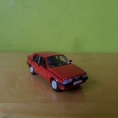 PCX H0 870052 Alfa Romeo 75 rood