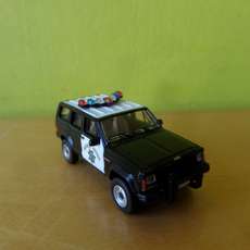 PCX H0 870730 Jeep Cherokee "Police"
