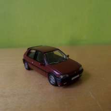 PCX H0 870750 Peugeot 106  donker rood
