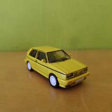PCX H0 871599 VW Golf rallye geel